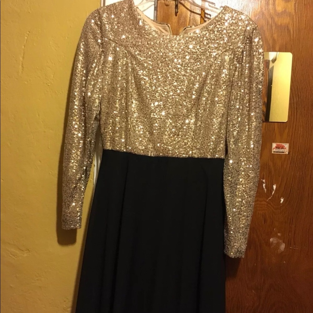 Shimmery gold and black long sleeved dress